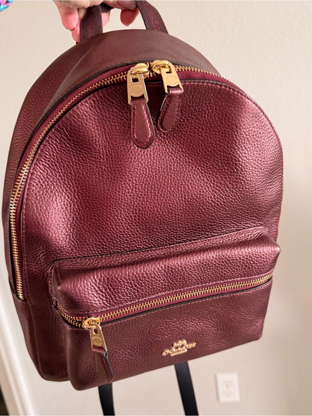 Coach EUC Charlie Metallic Wine Pebbled Leather medium Backpack with hang tag